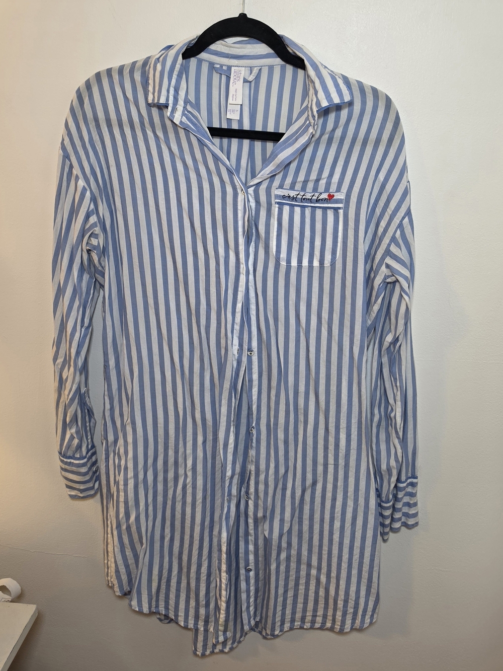 stars above Blue and White Striped Button-Down Shirt